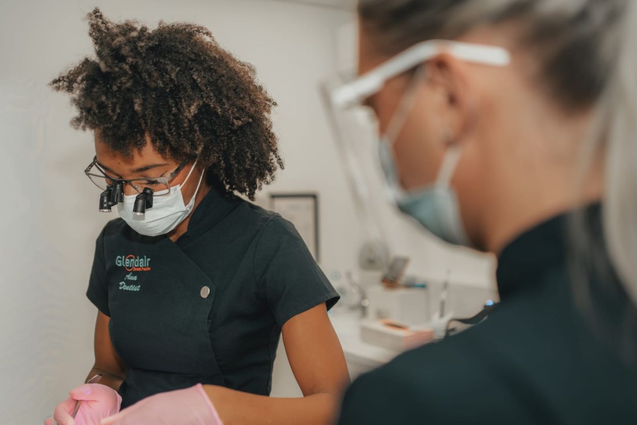 Dentist carrying out a general dental examination at Glendair Dental Practice, Alfreton